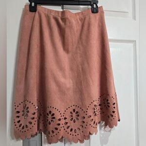 Orange seude skirt with floral cutouts